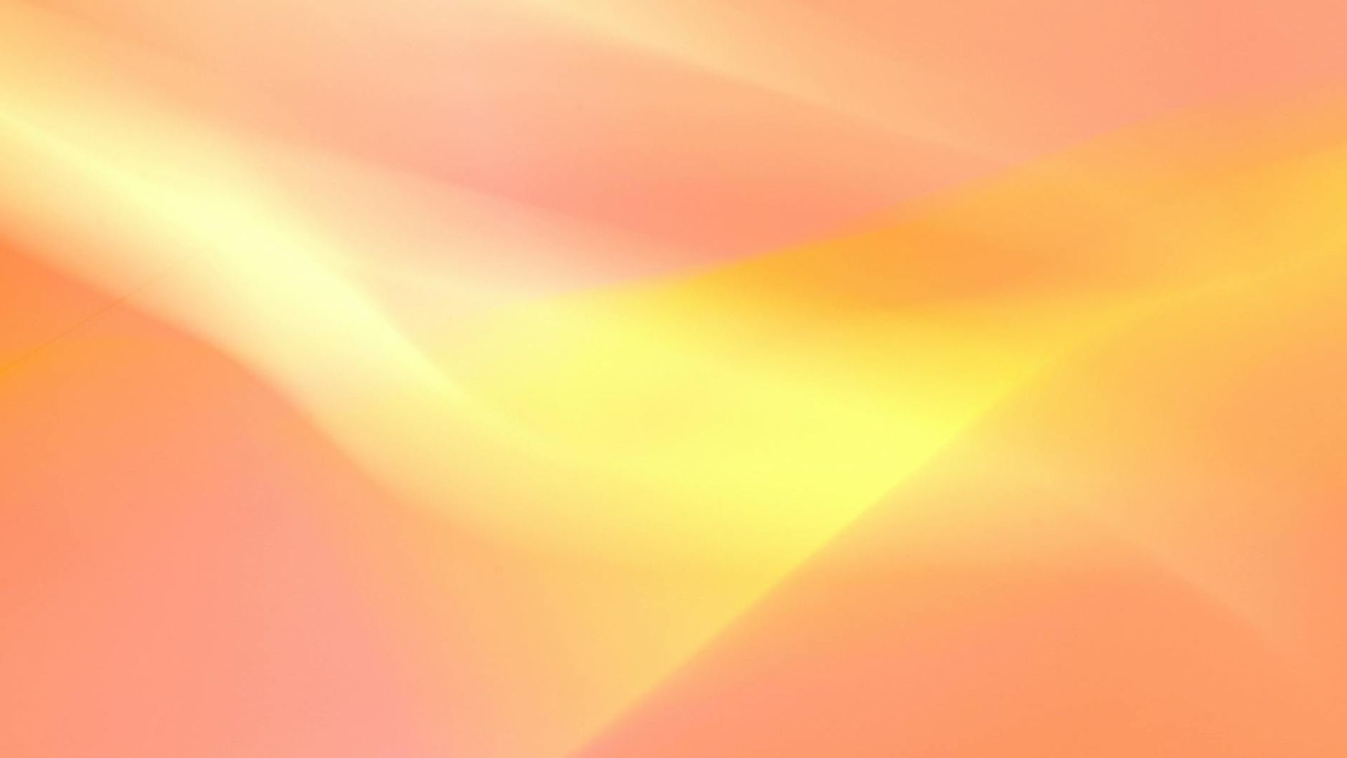 Abstract motion blur in soft peach and dark tones representing energy flow.